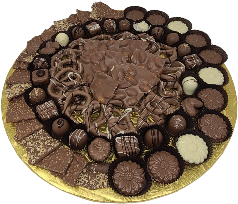 An all chocolate gift.  Around a center of mixed chocolate barks we place rows of truffles, chocolate dipped pretzels and chocolate daisies.  Great for a sweet table or an office party.